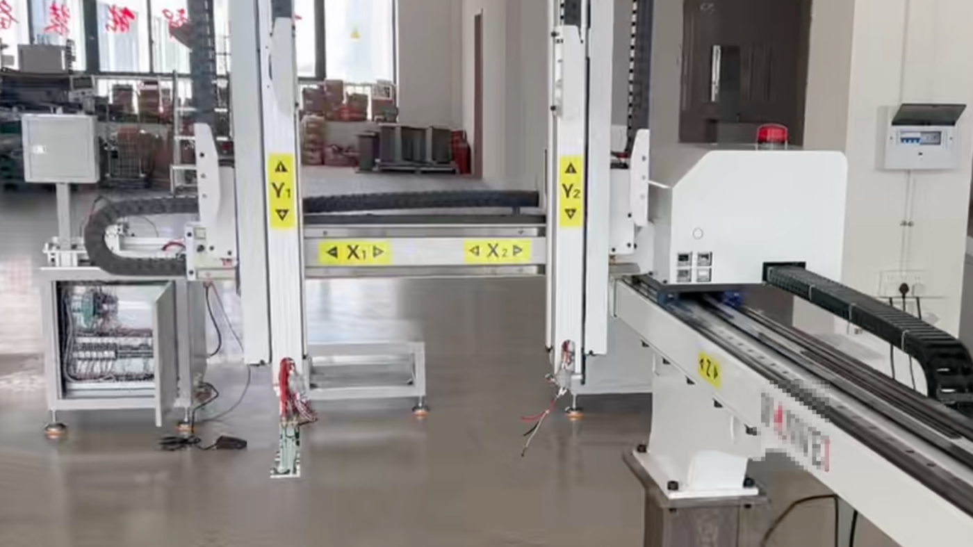 Automated workshop equipment photographed during a Taotao factory visit